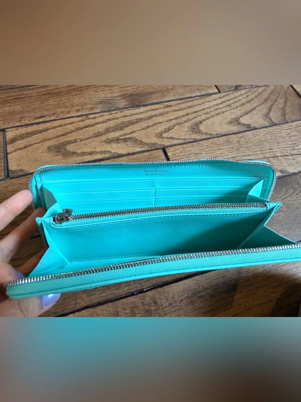 Tiffany & Co. tags embossed zipper